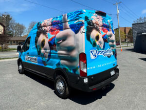 Blue Imperial Pools van with swimmer mural