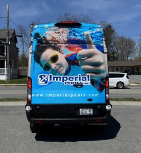 Imperial Pools van featuring underwater swimmer giving thumbs-up