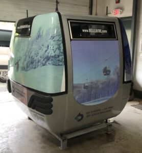 Gondola cabin with snowy mountain graphic