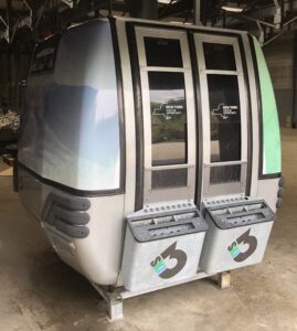 Ski resort gondola cabin with New York decals