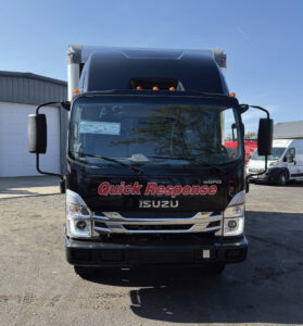 Front view black Isuzu Quick Response truck