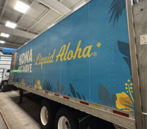 Blue Kona Liquid Aloha trailer with floral design